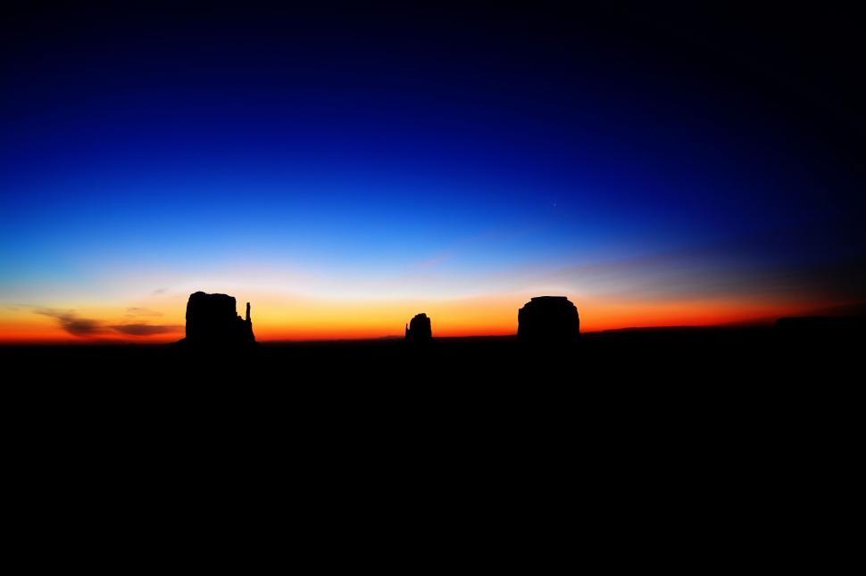 Free Image of Sun Setting Over Field 