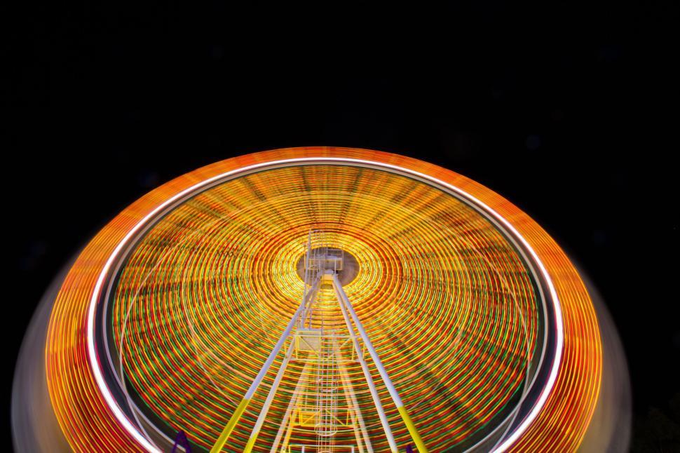 Free Image of Ferris Wheel Illuminated at Night 