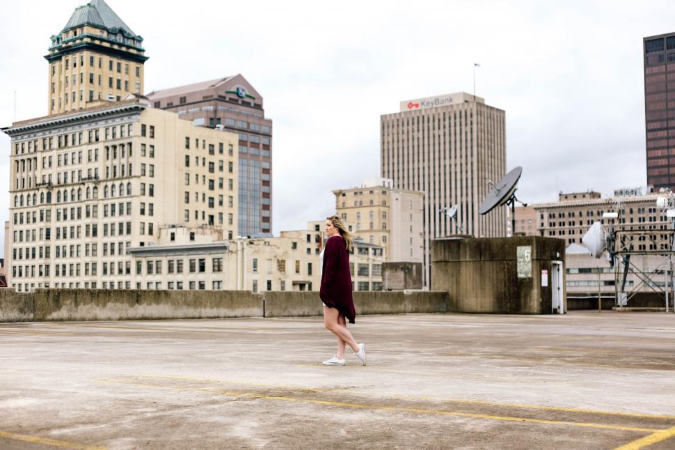Free Image of Person Standing in Empty Parking Lot 