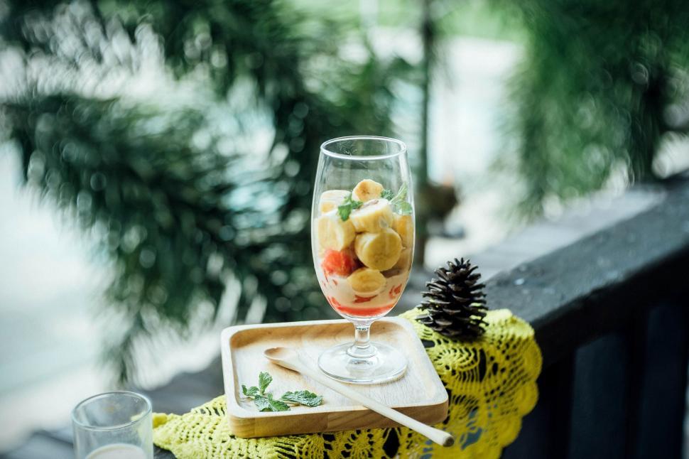 Free Image of Tray of Food and Glass of Wine on Table 