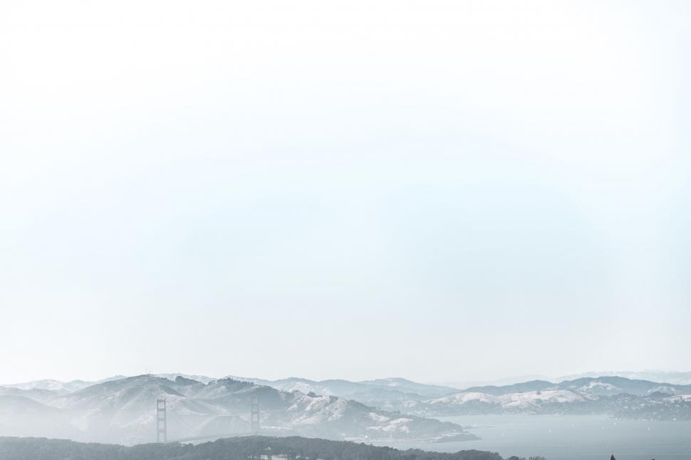 Free Image of Skier on Snowy Mountain Range 