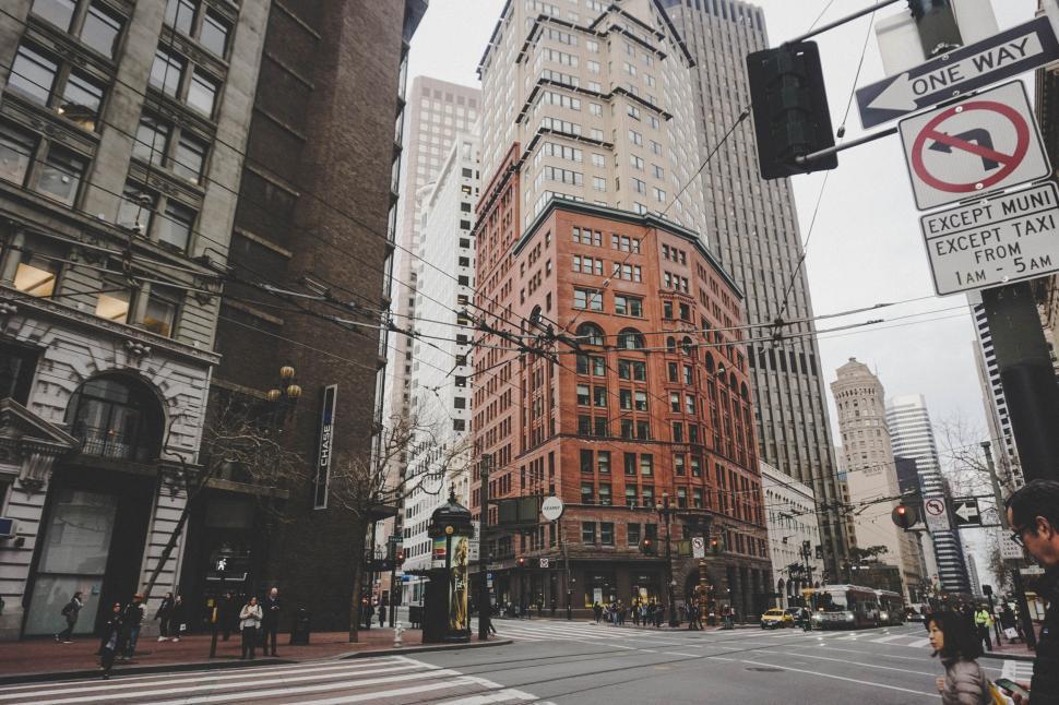 Free Image of City Street Filled With Tall Buildings 