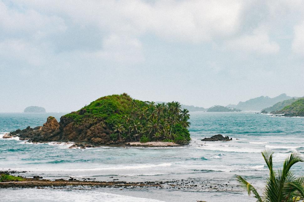 Free Image of Small Island in the Middle of the Ocean 