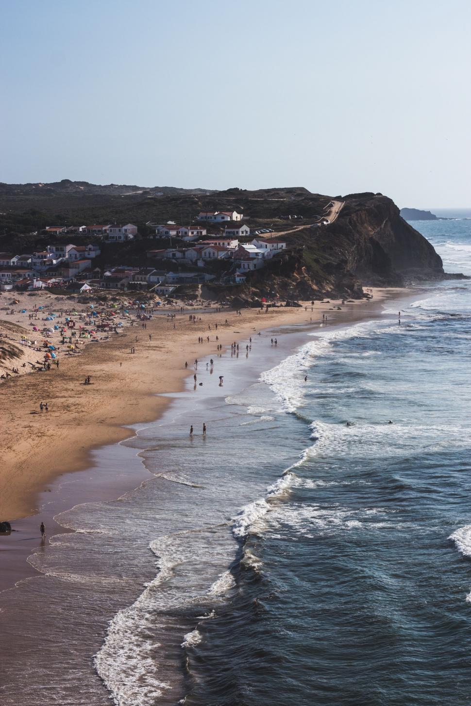 Free Image of Crowded Beach With Many People Enjoying the Sun and Sand 