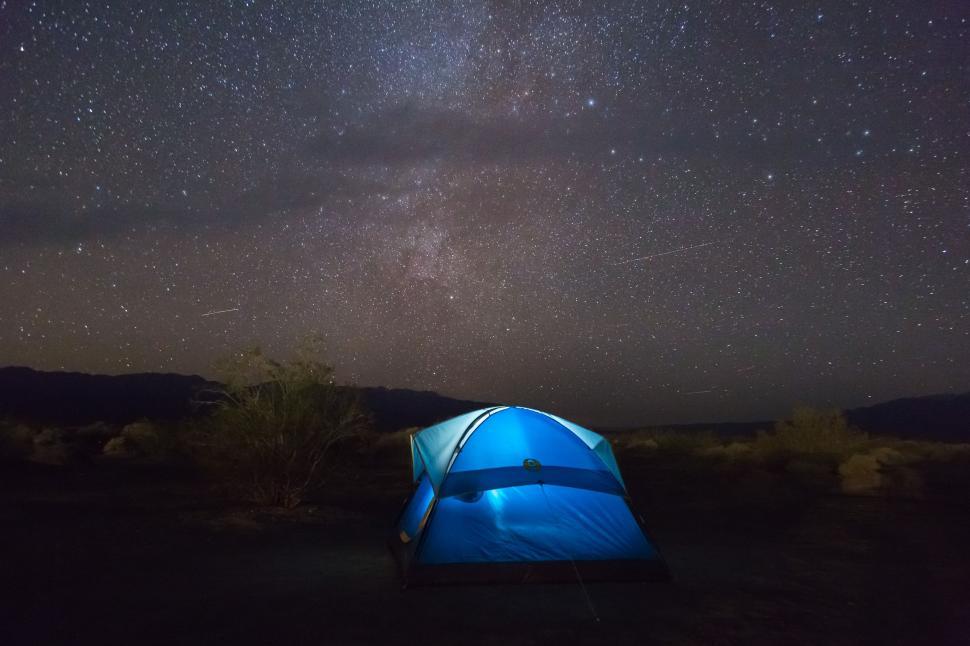 Free Image of Blue Tent in Field Under Night Sky 