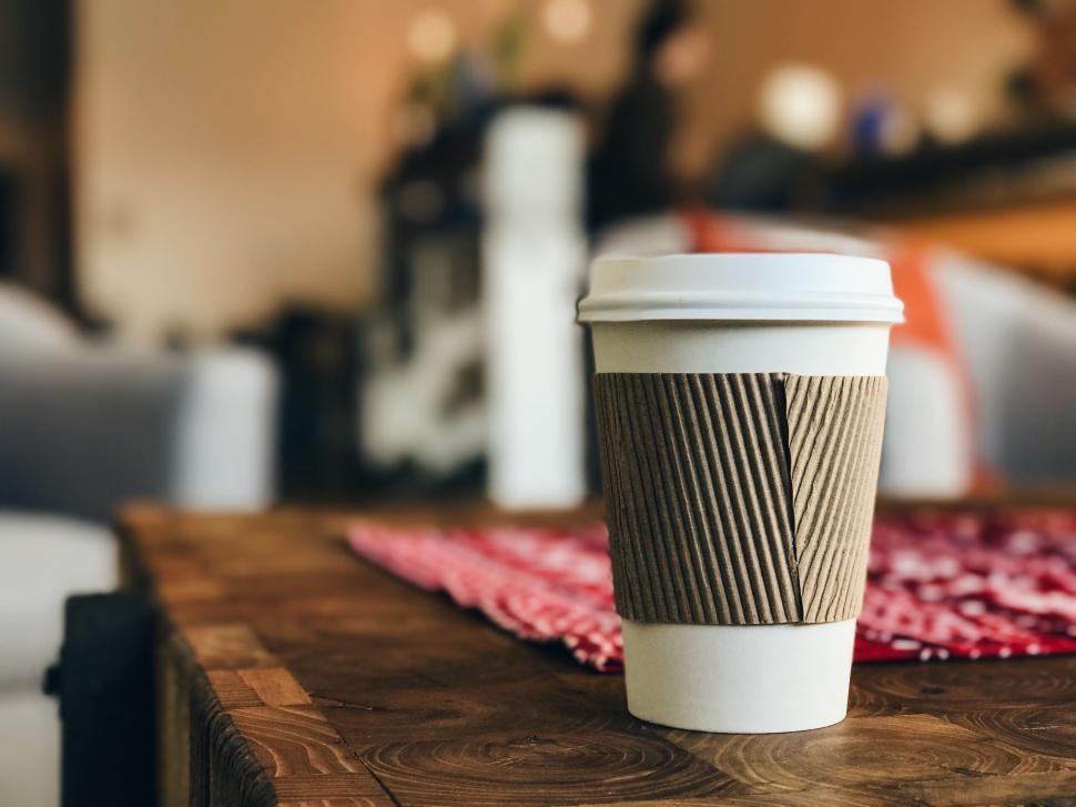 Free Image of Coffee Cup on Wooden Table 