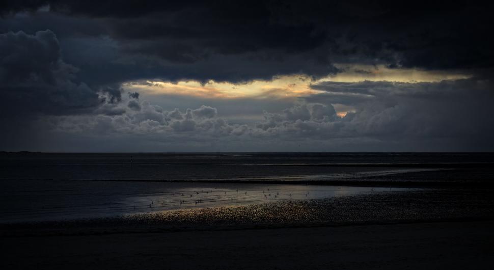 Free Image of Ocean Under Cloudy Sky 