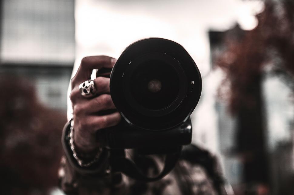 Free Image of Person Taking a Picture With a Camera 