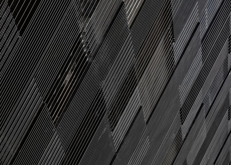Free Image of Contrast of a Black and White Wall 