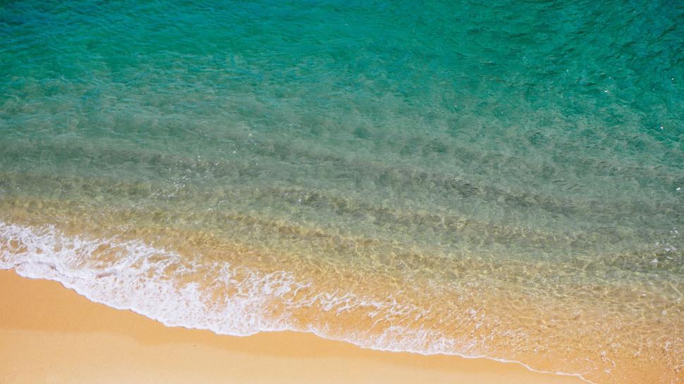 Free Image of Aerial View of Sandy Beach and Ocean 