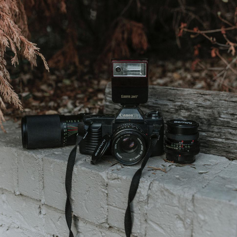 Free Image of Camera on Top of Brick Wall 