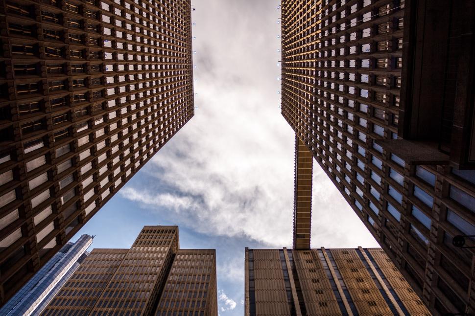Free Image of Looking Up at Tall Buildings in a City 