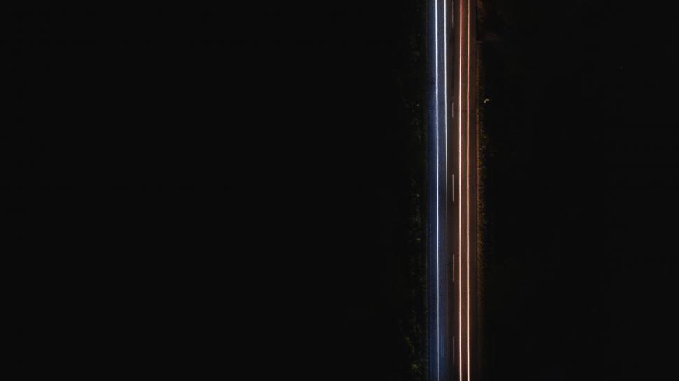 Free Image of The Back of a Cell Phone With Black Background 