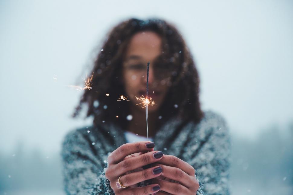 Free Image of Woman Holding Sparkler in Hands 