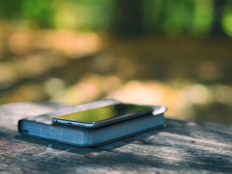 Free Image of Cell Phone on Wooden Table 