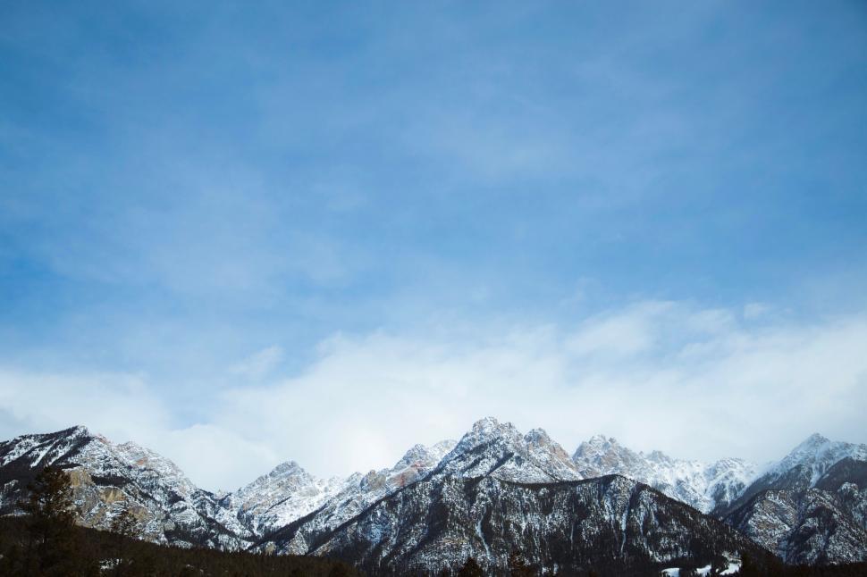 Free Image of Snowboarder Performs Trick in Mid-Air 