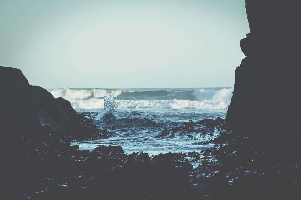 Free Image of Ocean Waves Crashing Against Rocks 