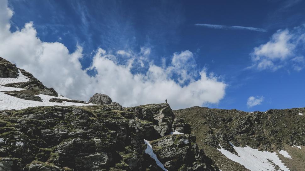 Free Image of Snowboarder Descending Snowy Mountain 