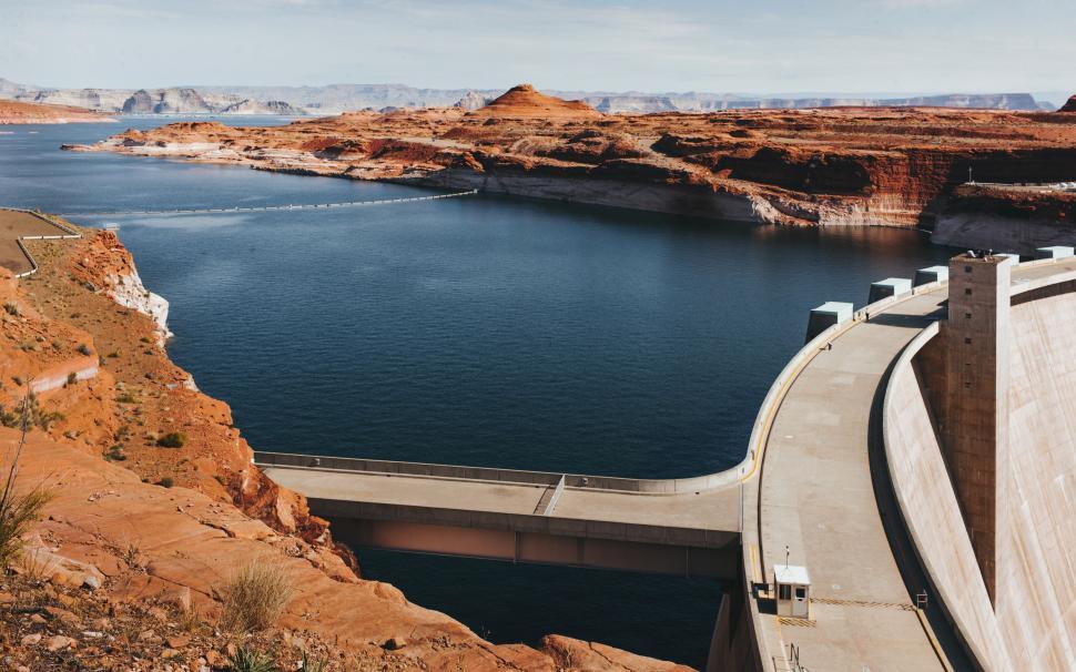 Free Image of Large Body of Water Next to Dam 