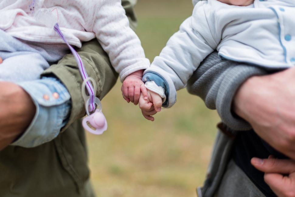 Free Image of Person Holding Baby in Close-up Shot 
