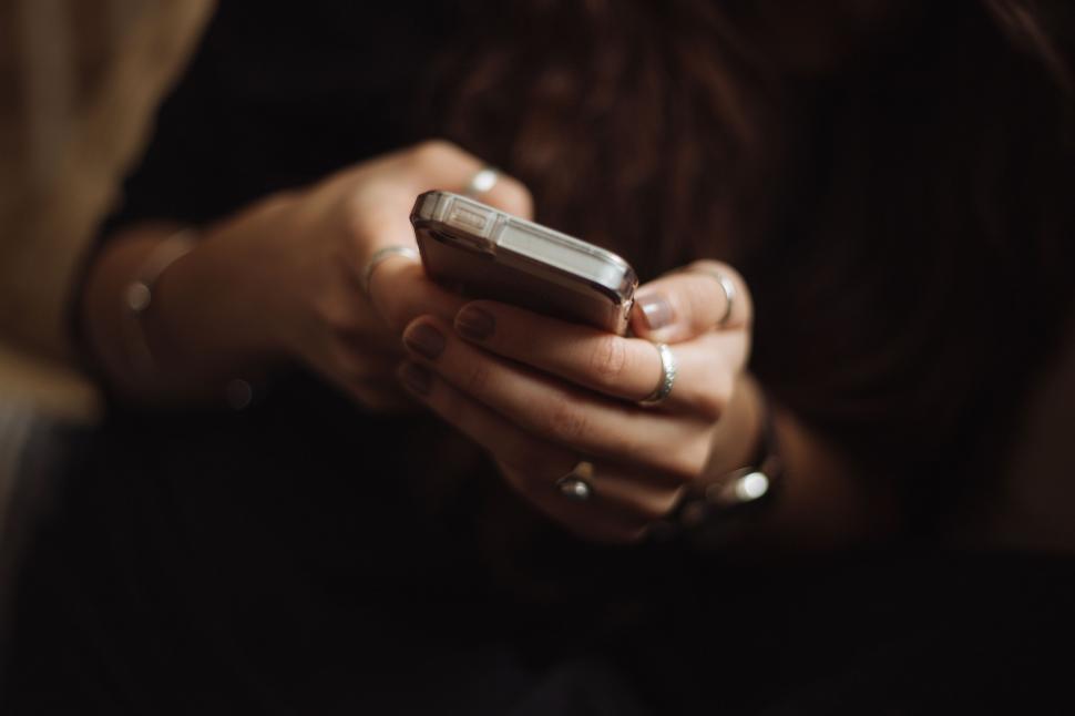 Free Image of Person Holding Cell Phone 