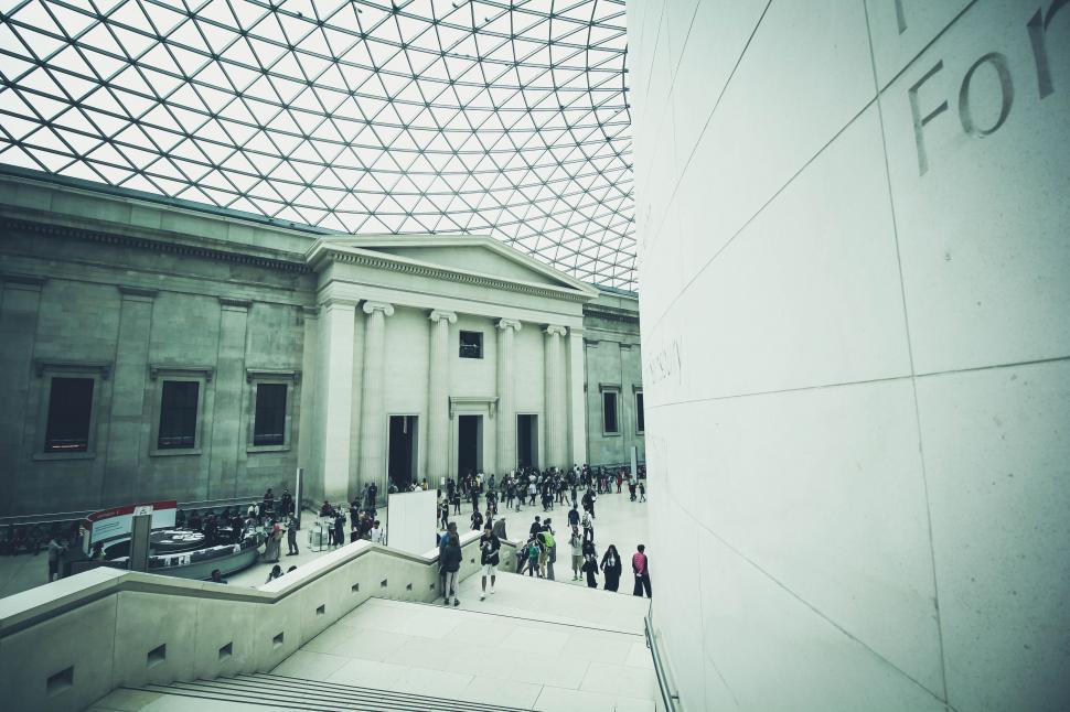 Free Image of Group of People Standing in Front of Building 