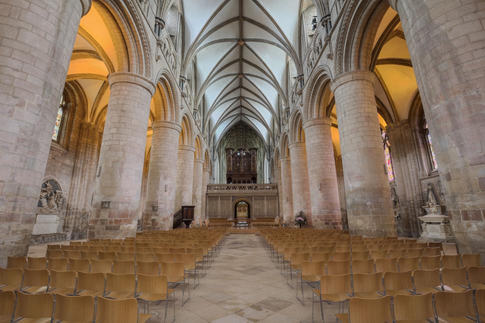 Free Image of Rows of Chairs Inside a Grand Cathedral 