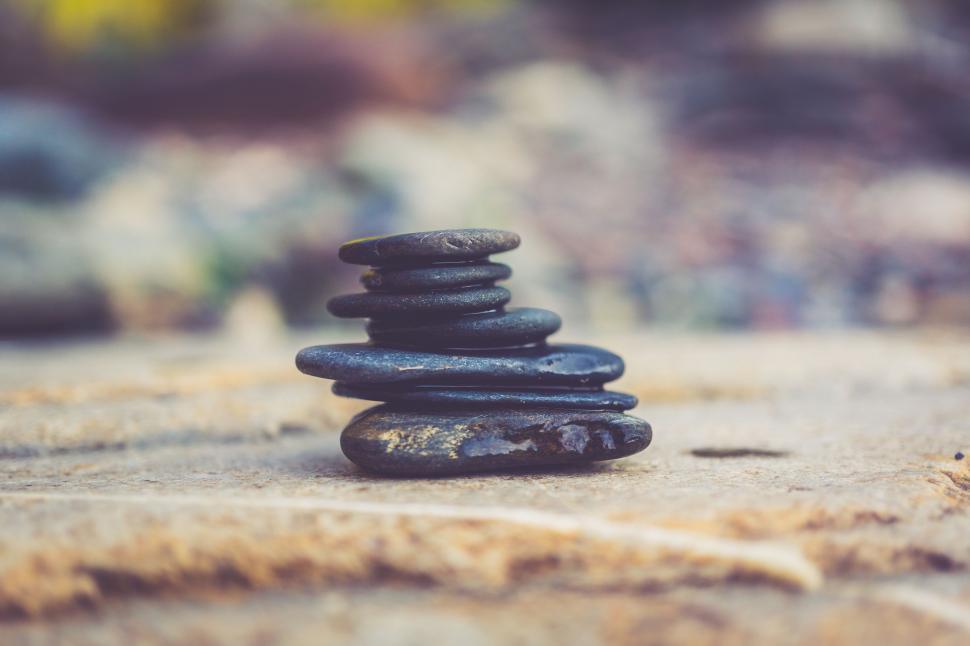 Free Image of Stack of Rocks on Sidewalk 