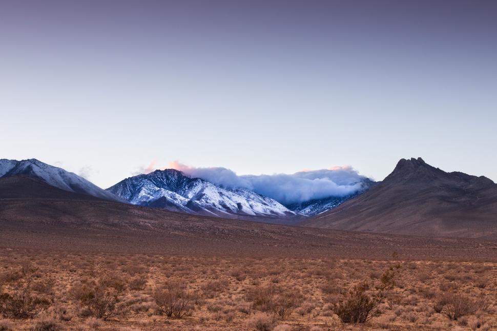 Free Image of Majestic Snow-Capped Mountain Range 