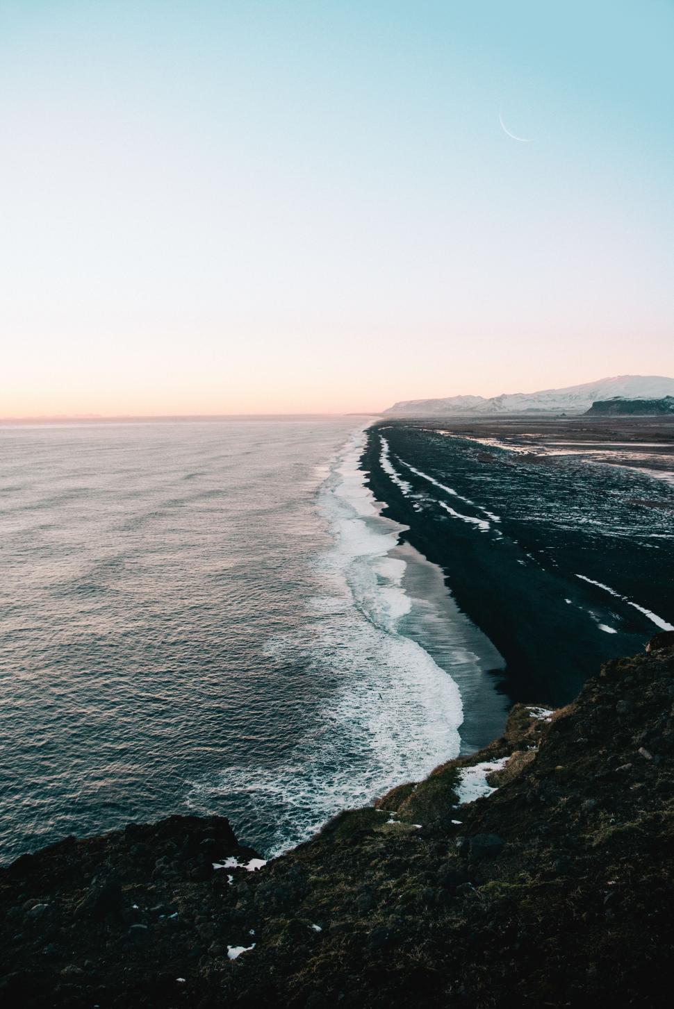 Free Image of A View of the Ocean From the Top of a Hill 