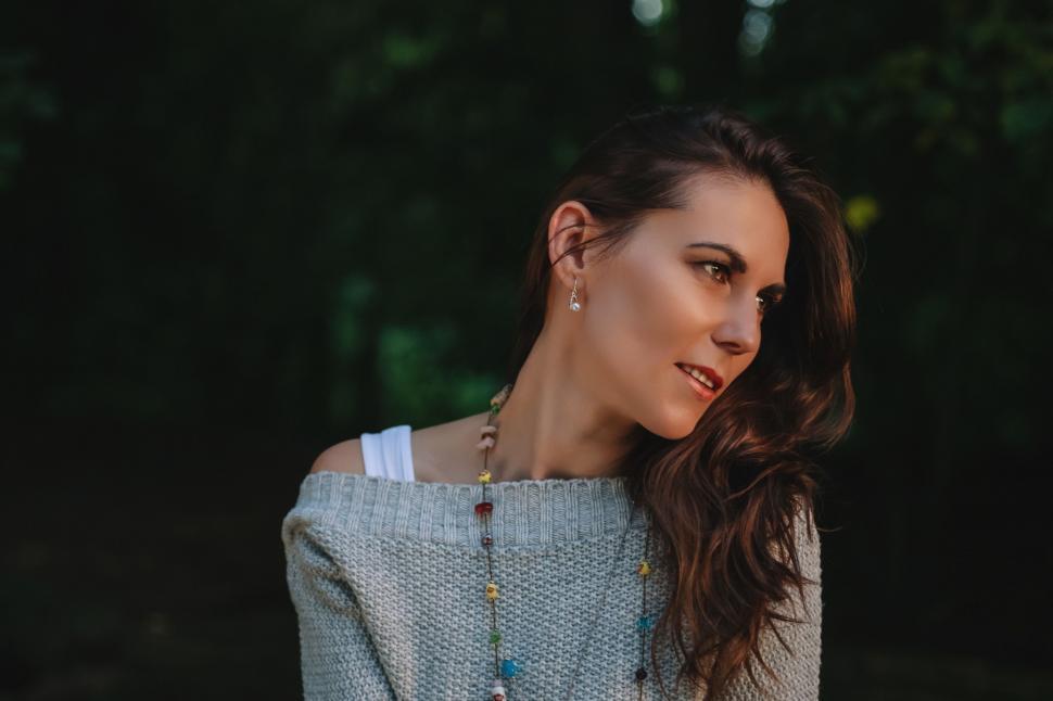 Free Image of Woman With Long Hair Wearing a Sweater 