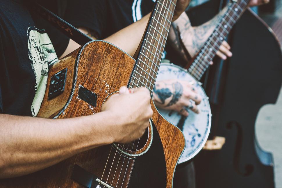 Free Image of Two Men Playing Guitars 