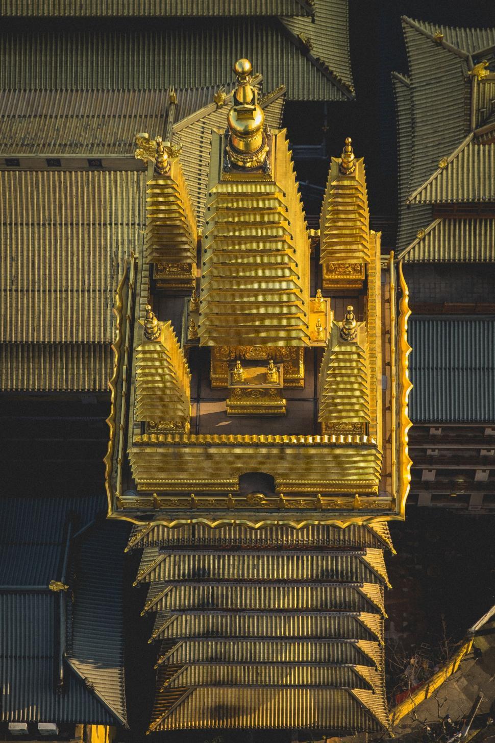 Free Image of Grand Golden Clock Tower Atop Building 