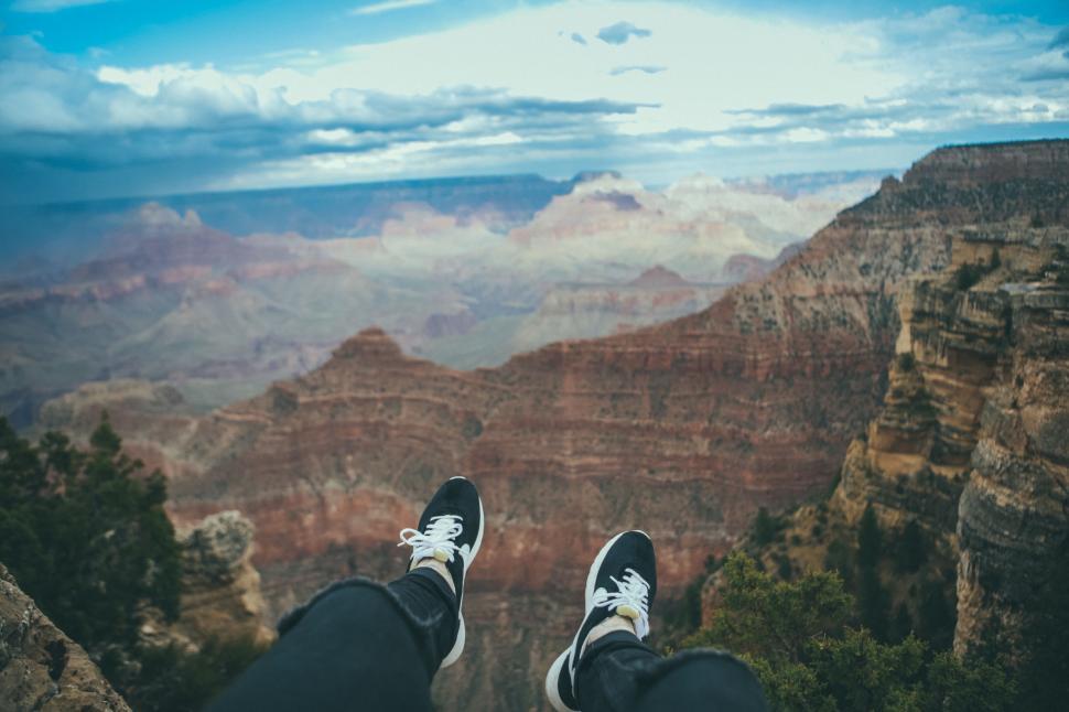 Free Image of Person Standing on Cliff Edge 