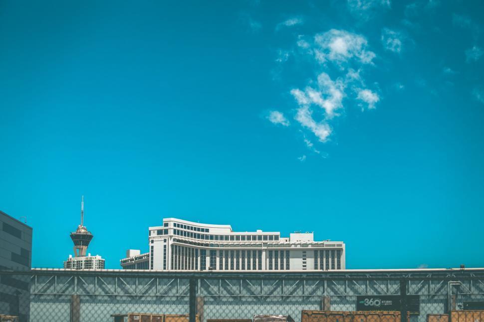 Free Image of Historic Building With Clock Tower in Background 