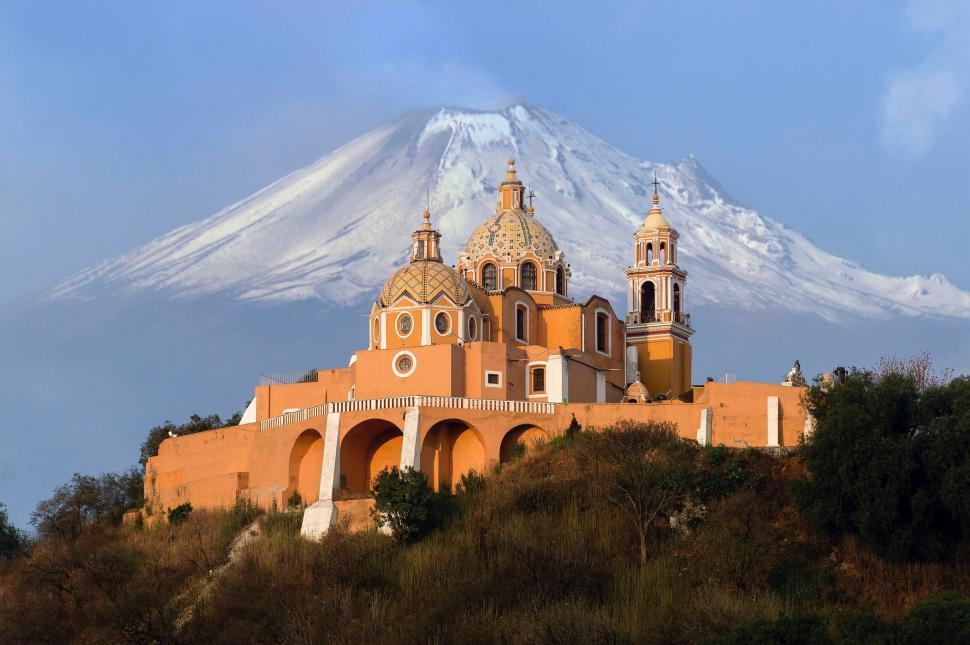 Free Image of Church on a Hill Overlooking Mountain 