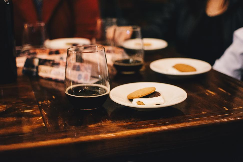 Free Image of Table Set With Plates of Food and Glasses of Wine 