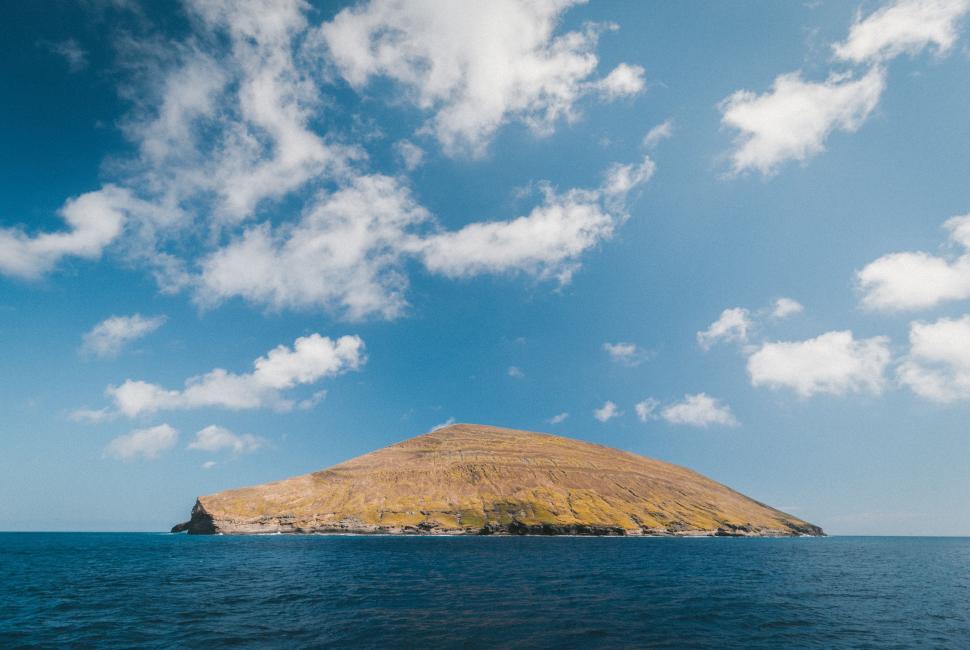 Free Image of Small Island in the Middle of the Ocean 