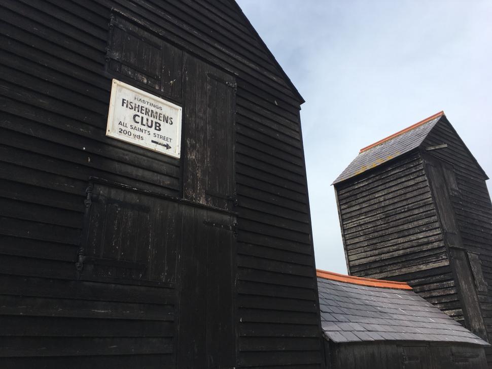 Free Image of Black Building With Sign 