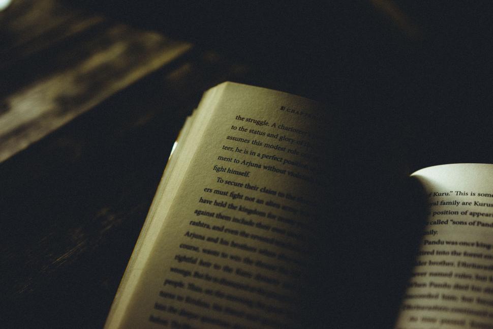 Free Image of Open Book on Table 
