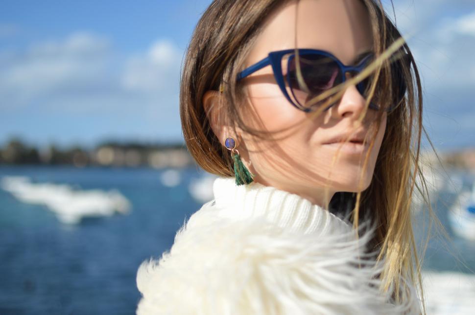 Free Image of Woman in Sunglasses by Water 