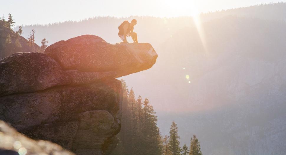 Free Image of Person Standing on Top of Cliff 