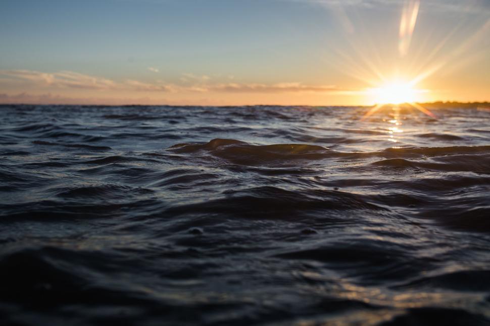 Free Image of Sun Setting Over Water 
