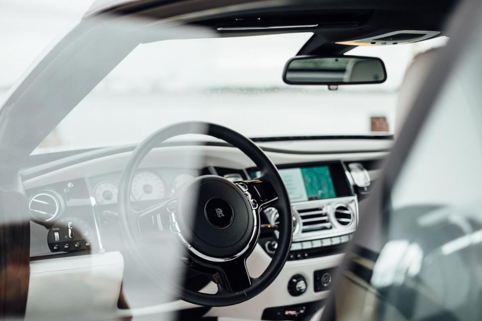 Free Image of Interior of a Car With Steering Wheel and Dashboard 
