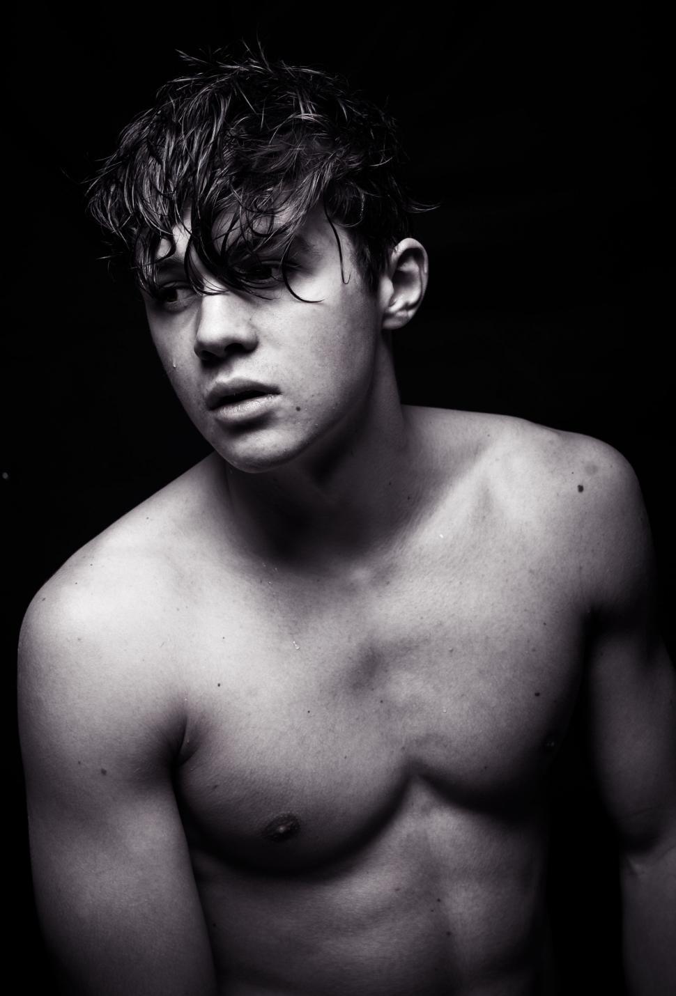 Free Image of Shirtless Young Man Posing for Picture 