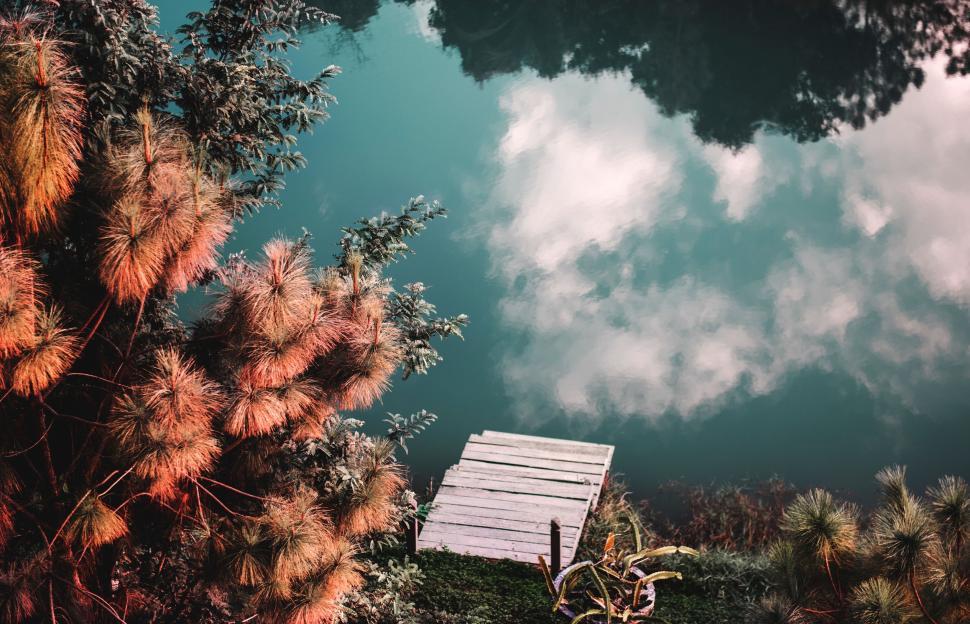 Free Image of Wooden Dock Next to Water 