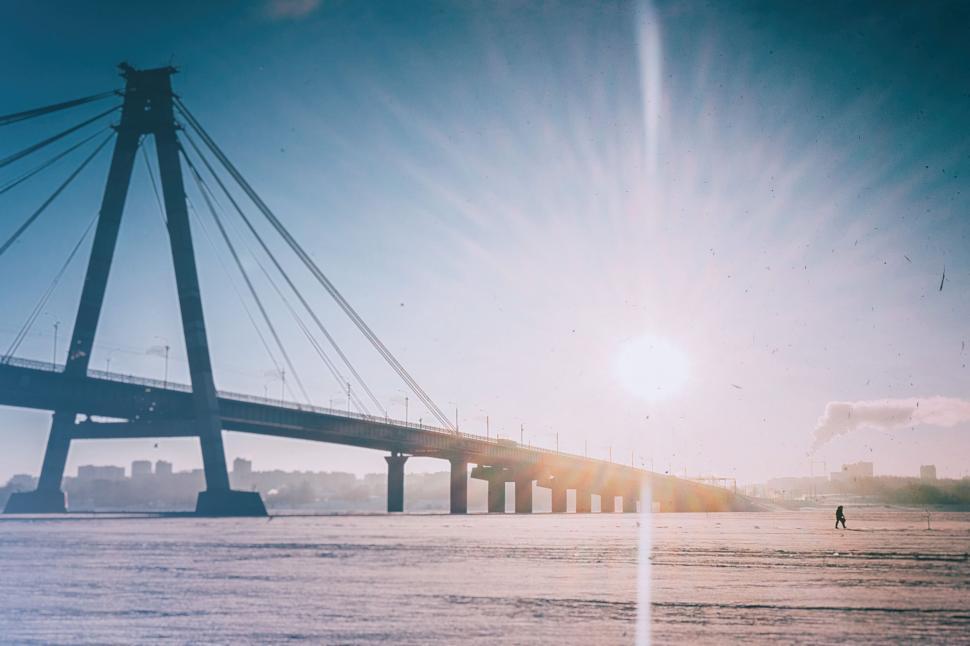 Free Image of Large Bridge Spanning Over a Large Body of Water 