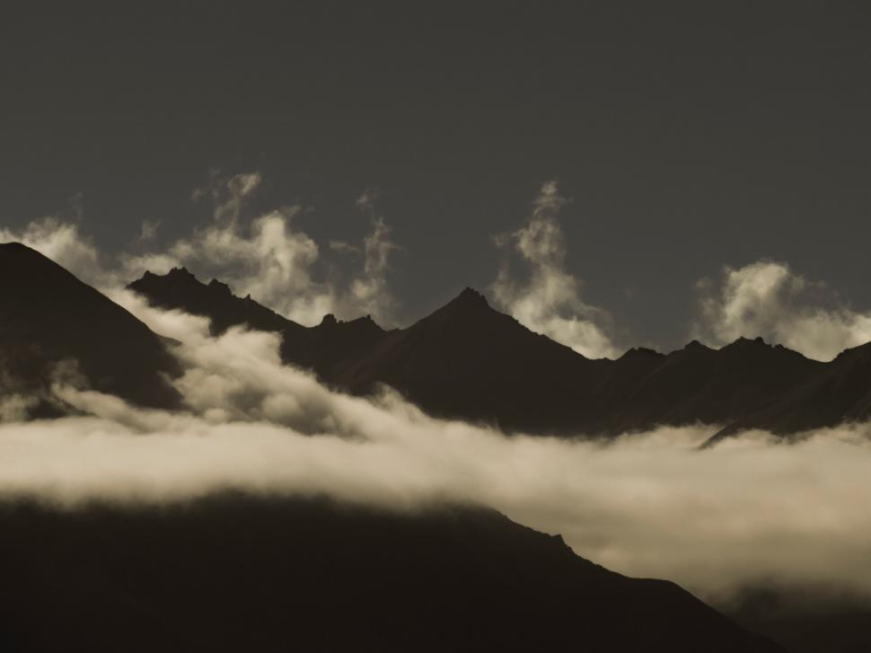 Free Image of Majestic Mountains and Clouds 