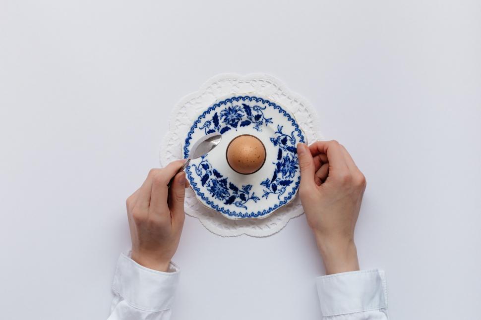 Free Image of Person Holding Plate With Hat 