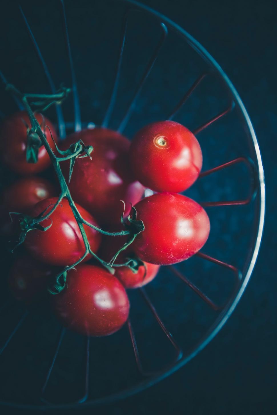 Free Image of Glass Bowl Filled With Tomatoes on a Table 